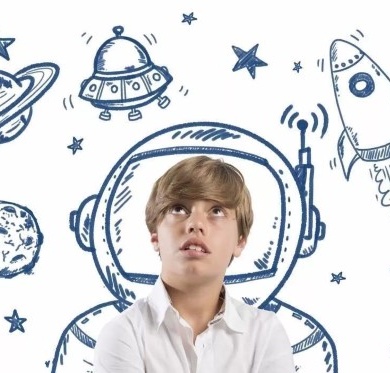 A boy imagines space adventure with drawings of rockets and planets.